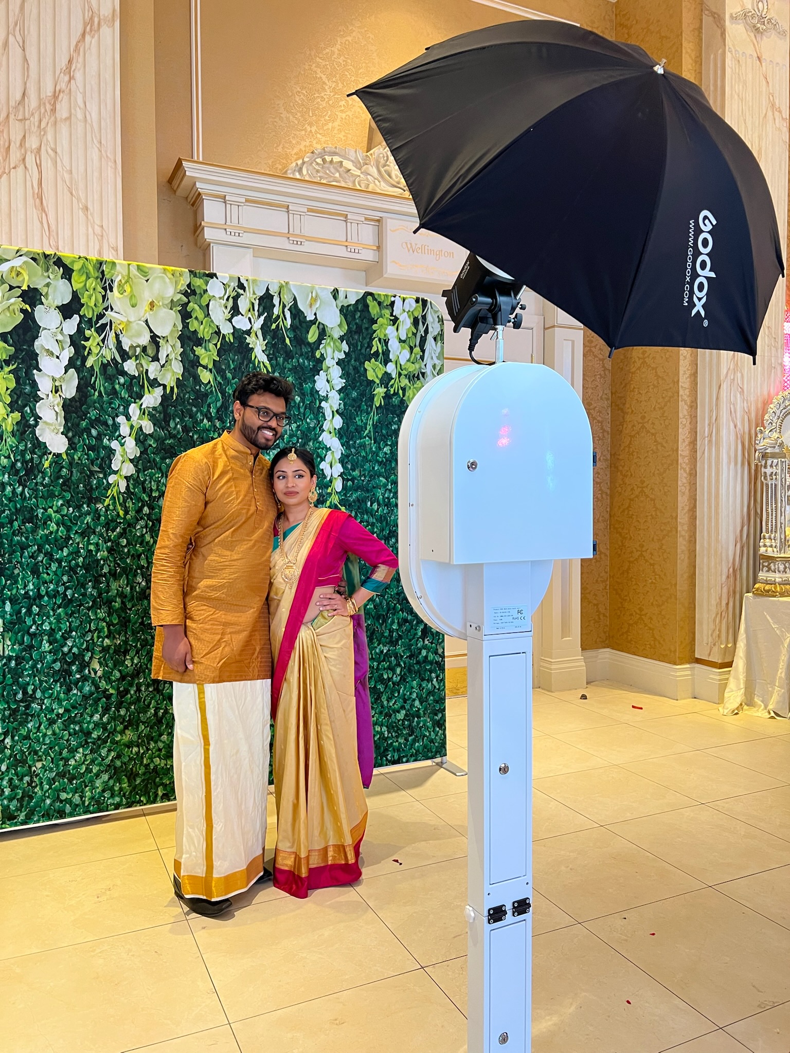 Guests enjoying the photo booth at a wedding
